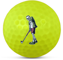 Load image into Gallery viewer, Bright yellow golf ball featuring a skeleton golfer design for customised golf balls